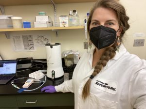Dr. Caroline Moore at work in the lab